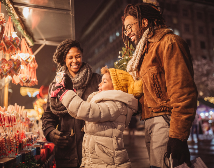 Family At Market Looking At Candy