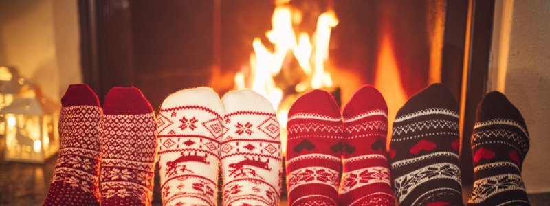 Family In Front Of Fireplace